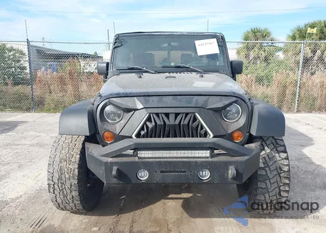 2010 Jeep Wrangler Unlimited Sport z USA, uszkodzony, nr VIN 1J4BB3H17AL200272